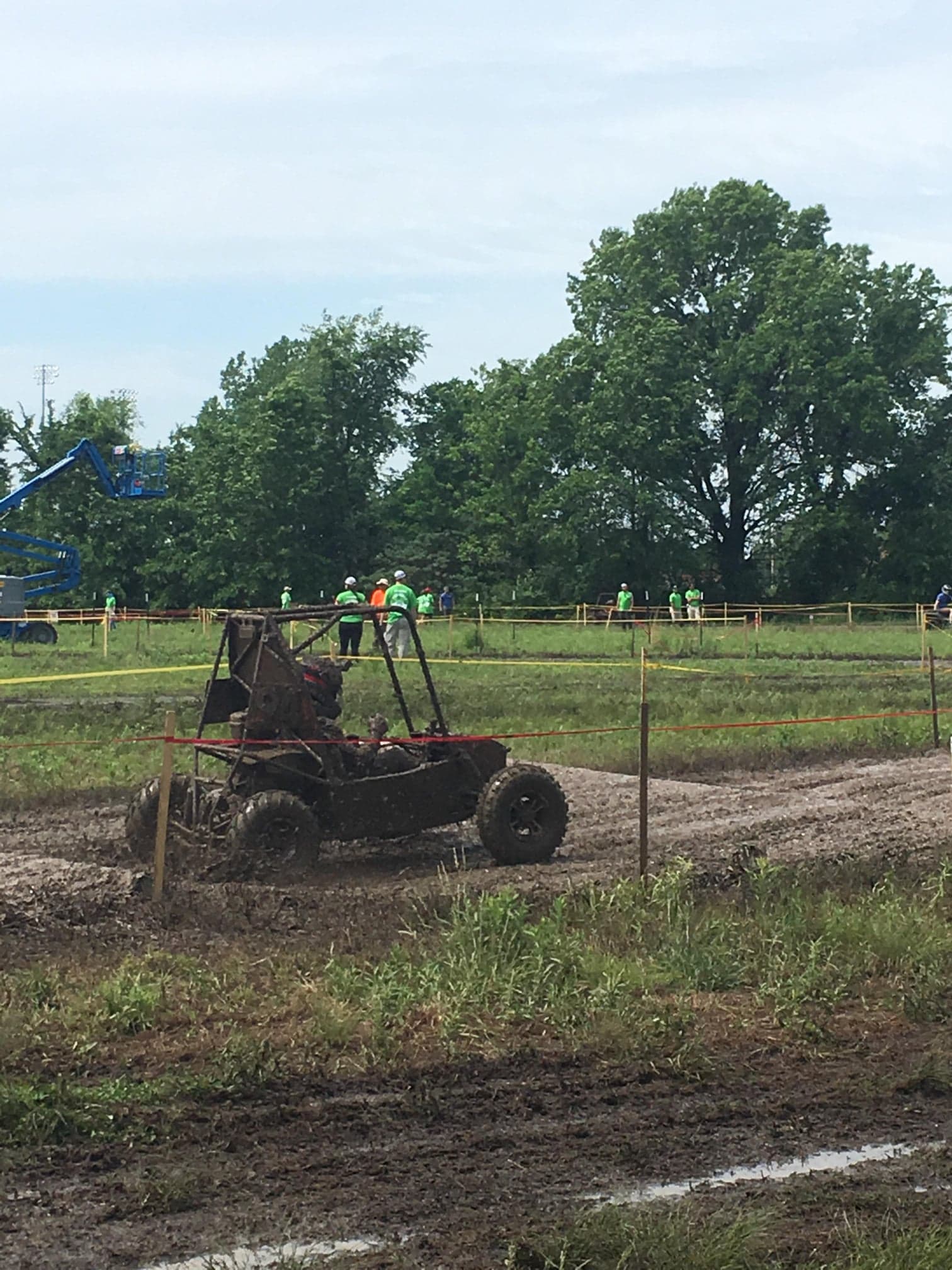 Image of a nearly unidentifiable baja car in a field.